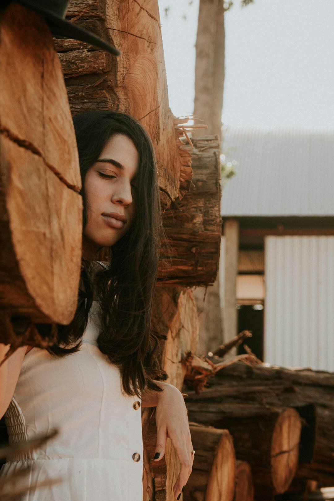 Brazilian woman smiling warmly outdoors