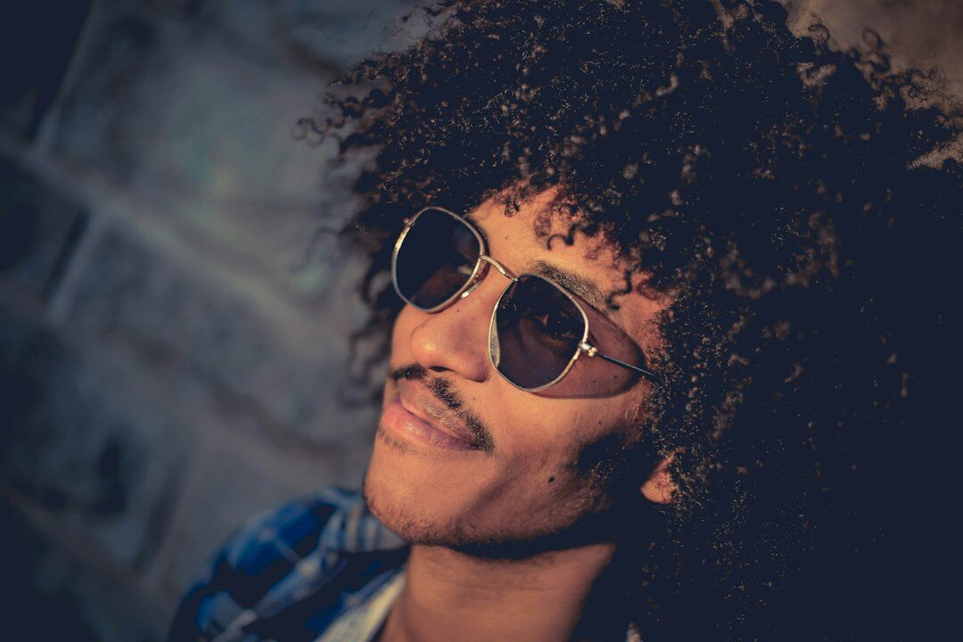 Young Afro-Brazilian man smiling professionally