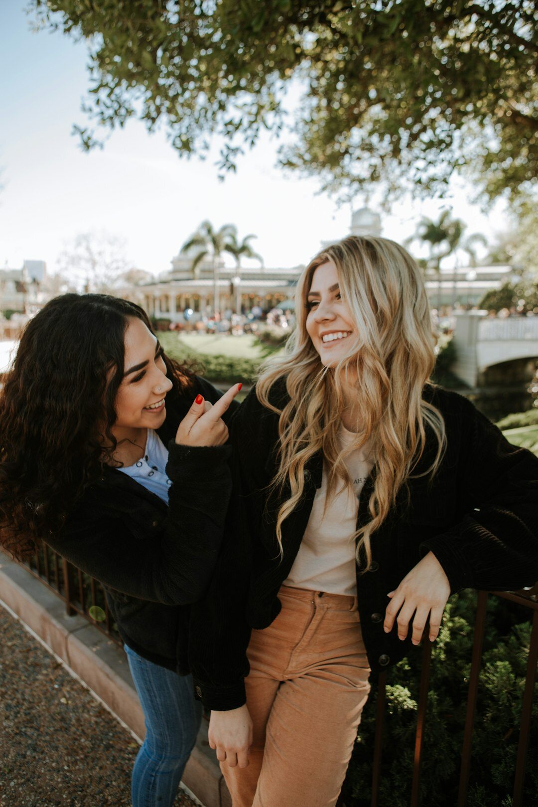 Small group of Brazilian friends laughing together outdoors