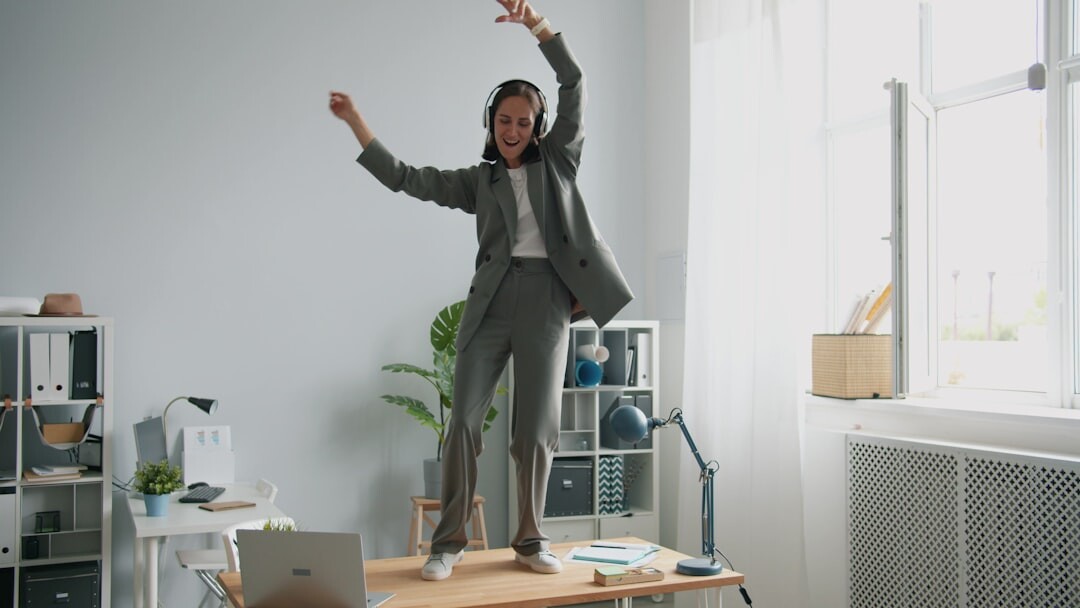 person stretching at desk